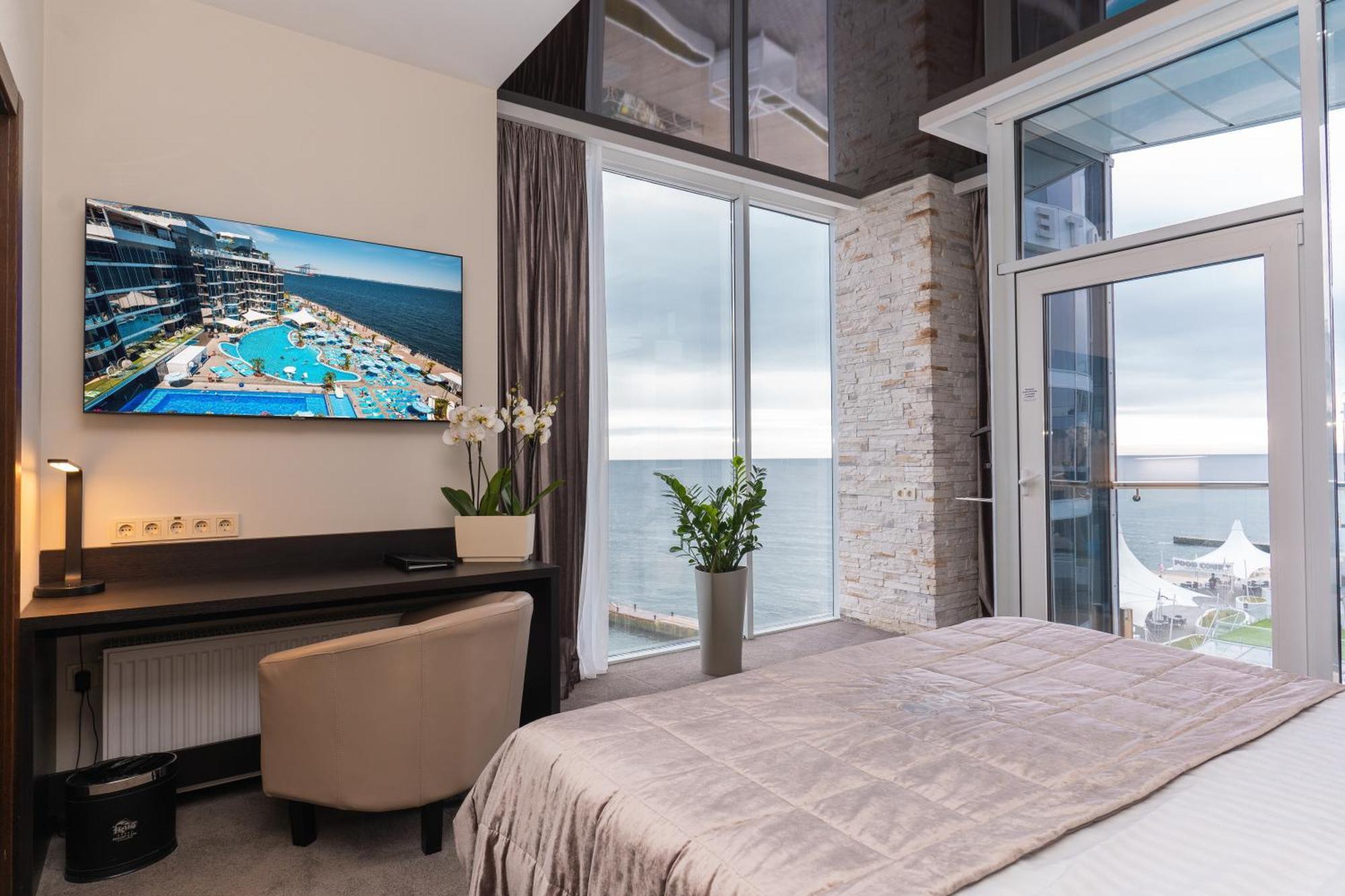 นีโม โฮเต็ล รีสอร์ต แอนด์ สปา Hotel โอเดสซา ห้อง รูปภาพ A bedroom in the hotel