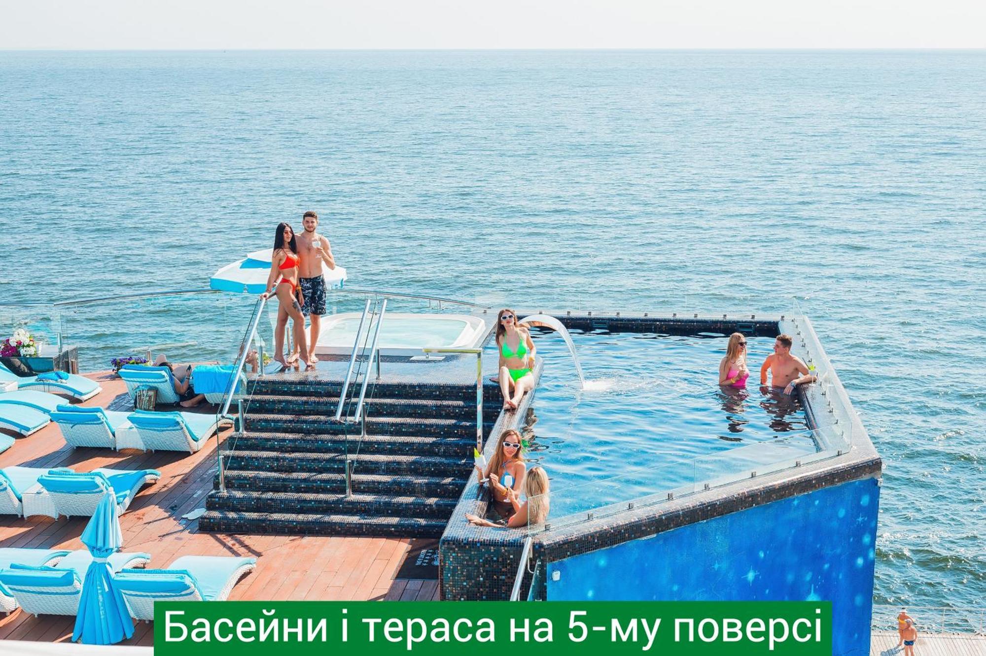 นีโม โฮเต็ล รีสอร์ต แอนด์ สปา Hotel โอเดสซา ภายนอก รูปภาพ Bathing and sunbathing on the 5-meter pier